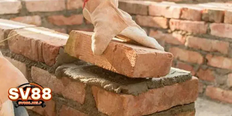 Ngủ mơ thấy gạch xếp chồng cao